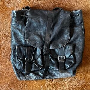 Distresssed leather john varvatos fold over backpack